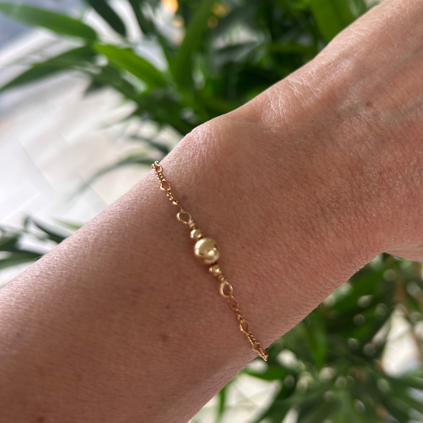 Beautiful Gold 3 ball bracelet.