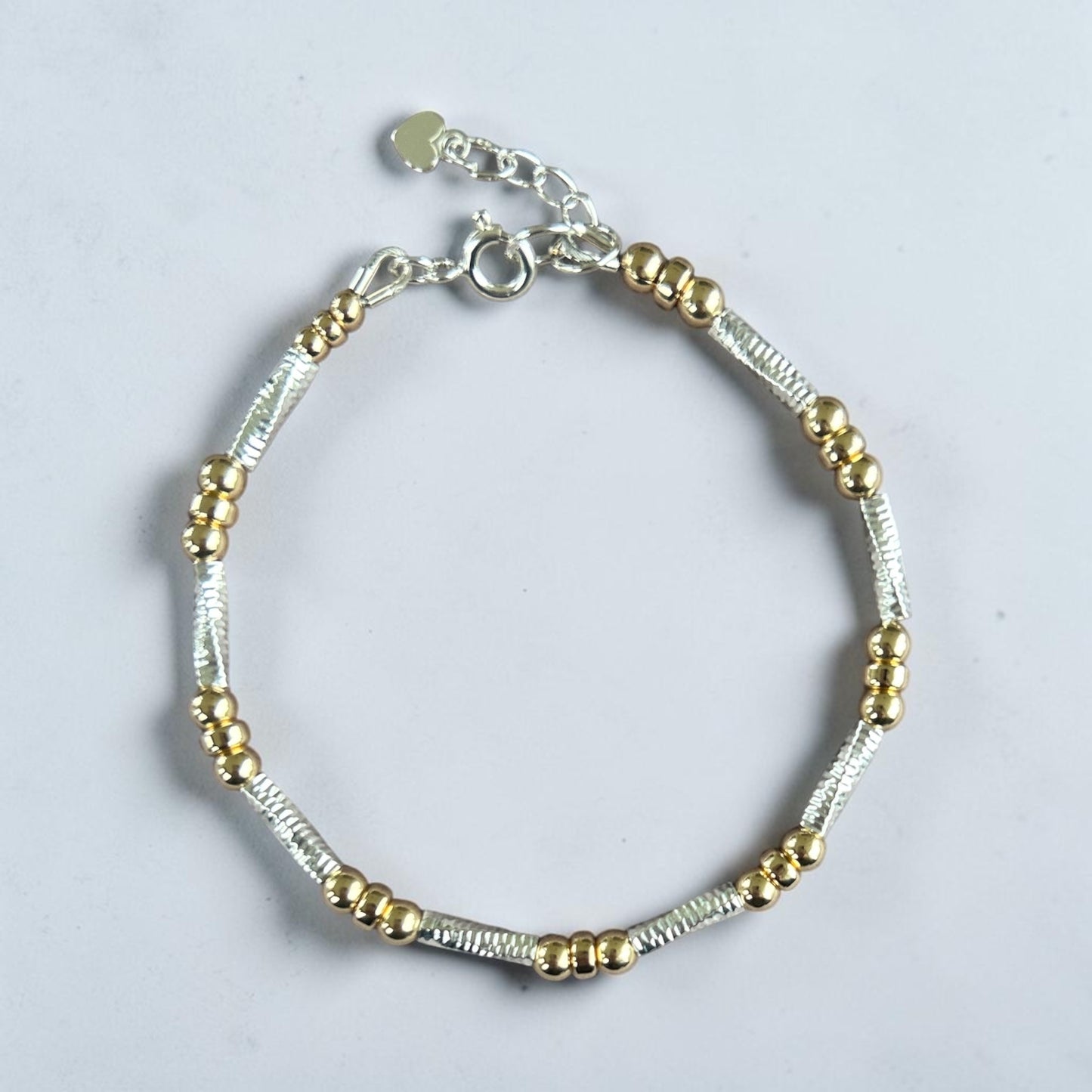 Gold and Silver tubular bracelet