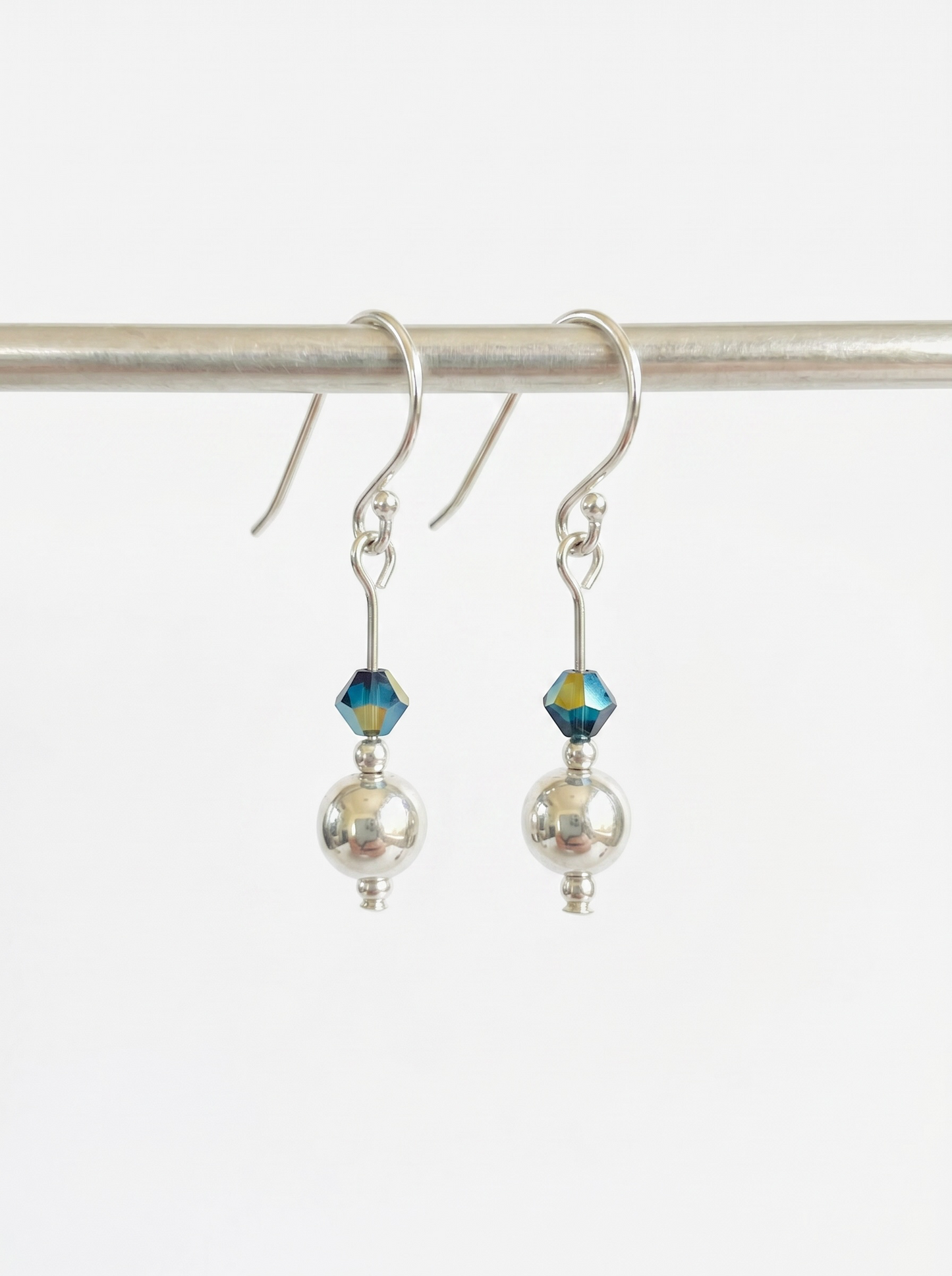 Swarovski X earrings.