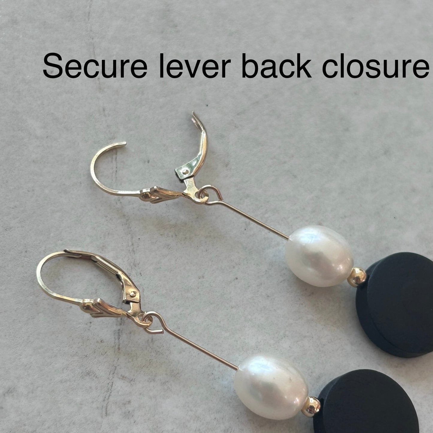Ebony and ivory Fresh water pearl  earrings.