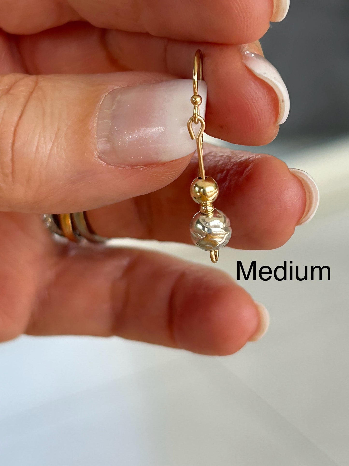 Gold with hammered silver earrings