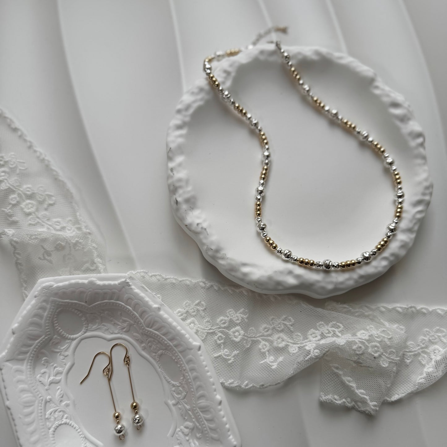 Gold with hammered silver earrings