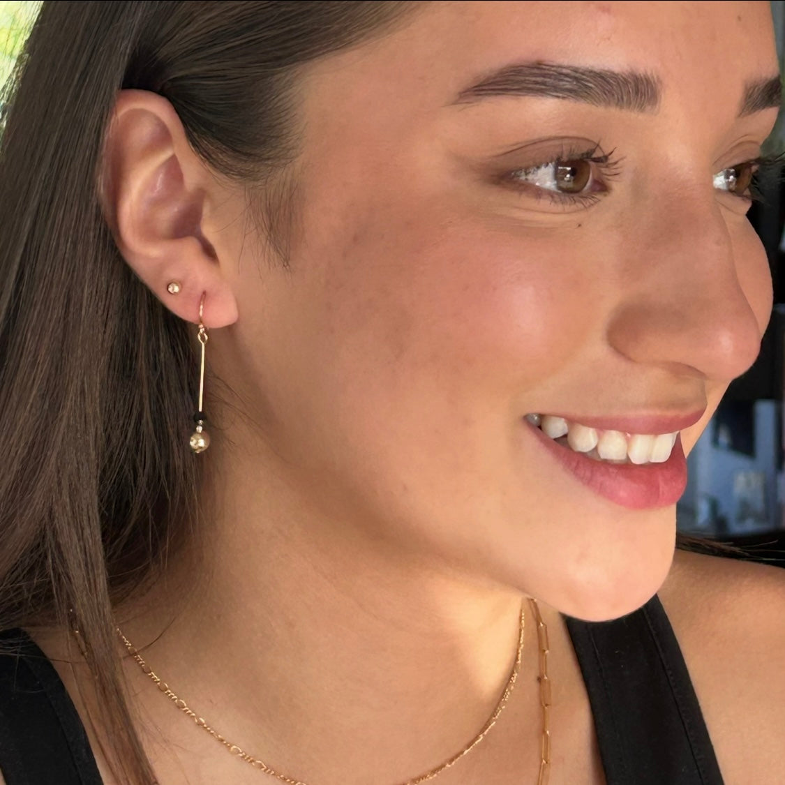 Swarovski X earrings.
