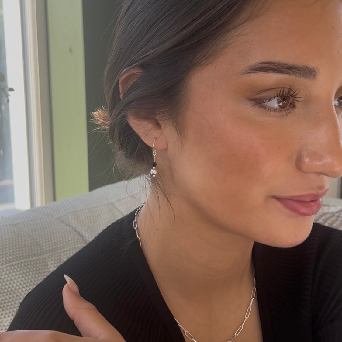 Swarovski X earrings.