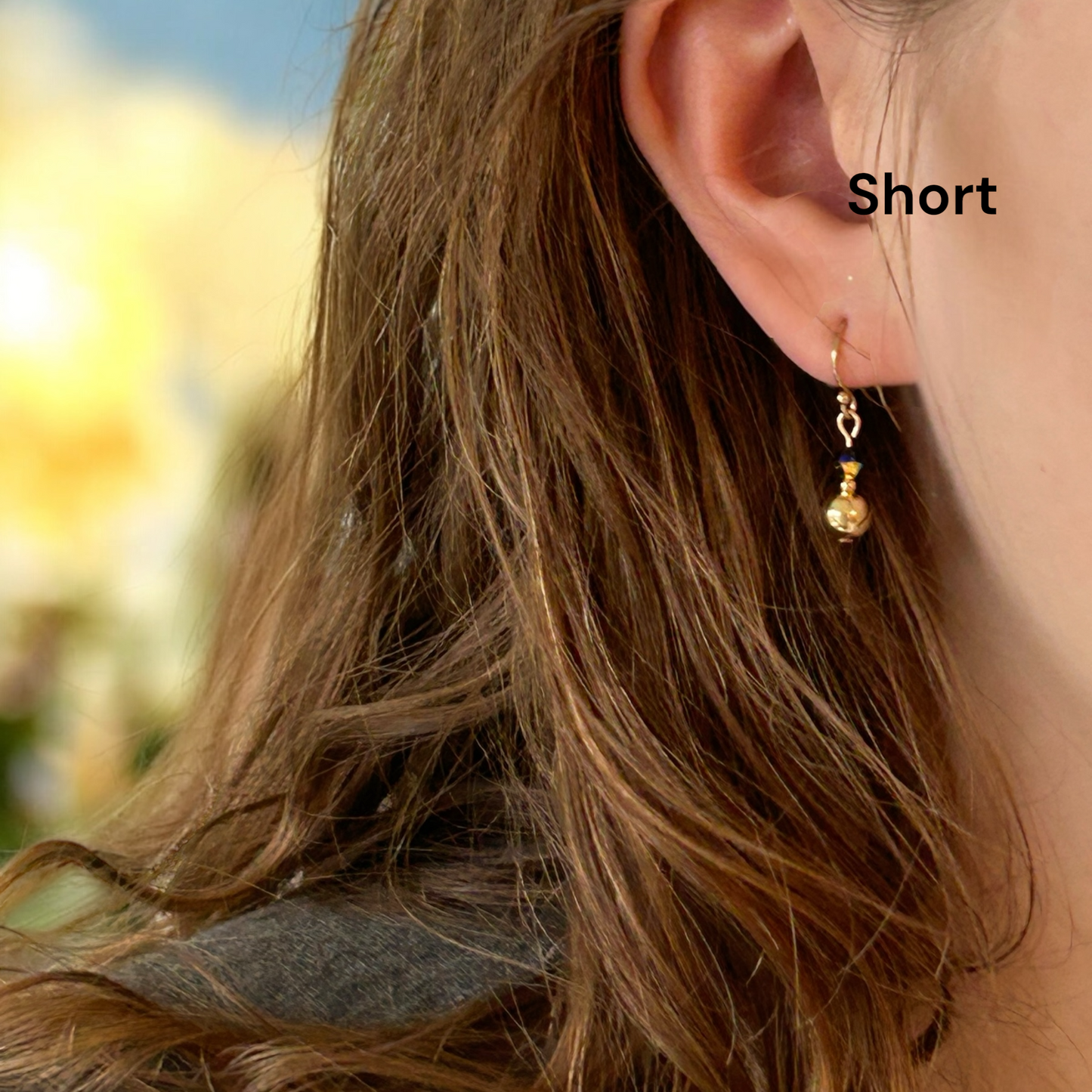 Swarovski X earrings.