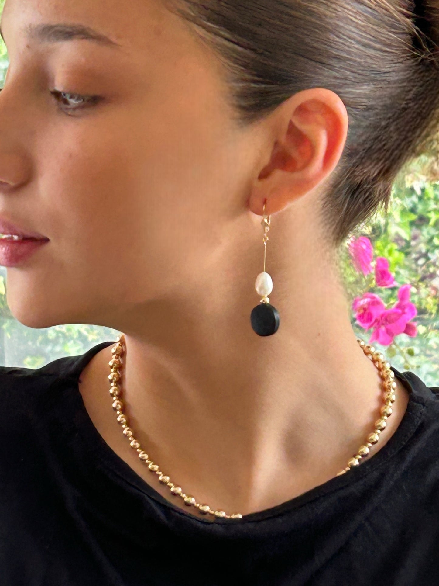 Ebony and ivory Fresh water pearl  earrings.