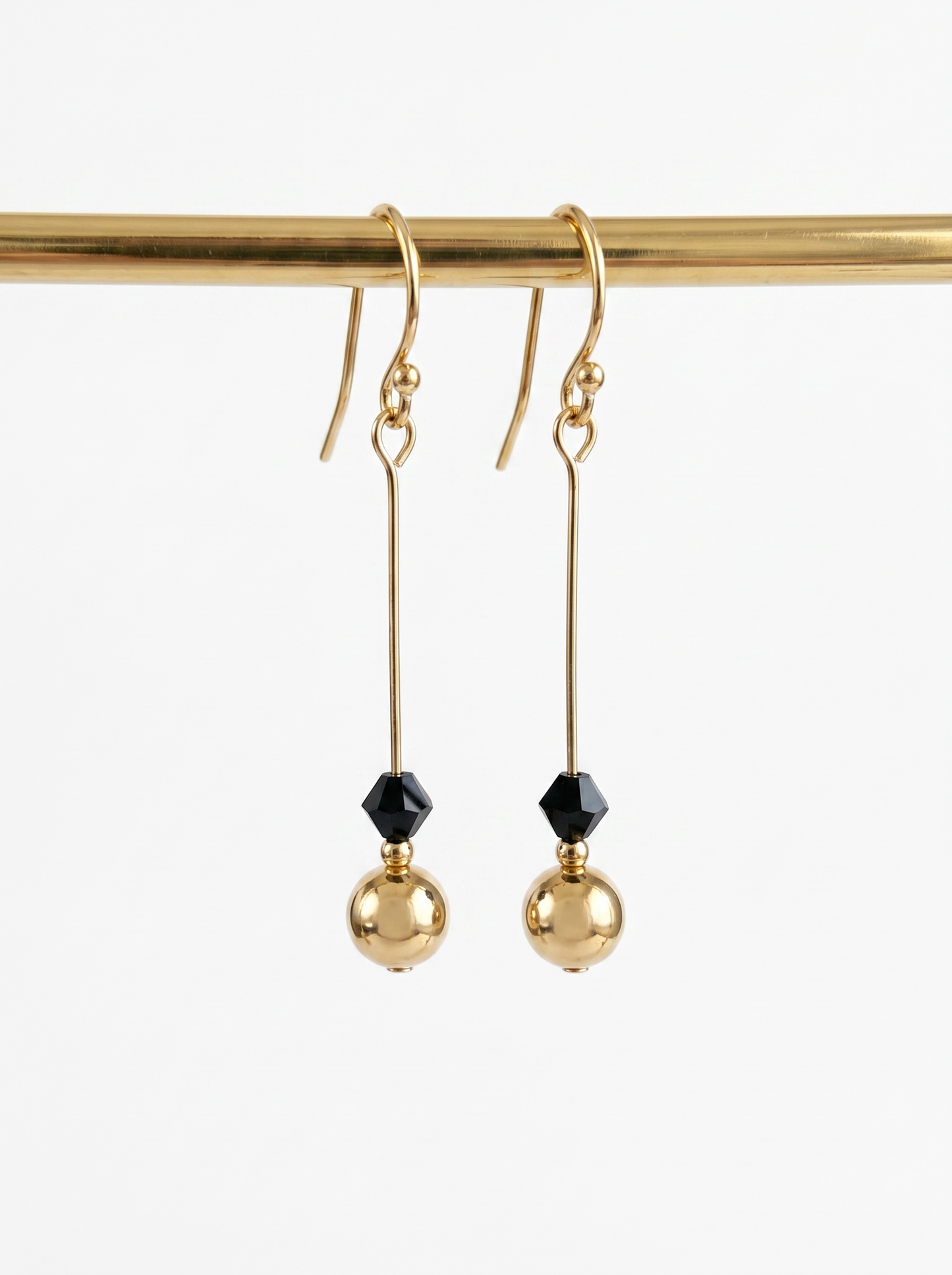 Swarovski X earrings.