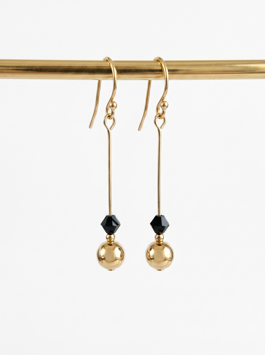 Swarovski X earrings.