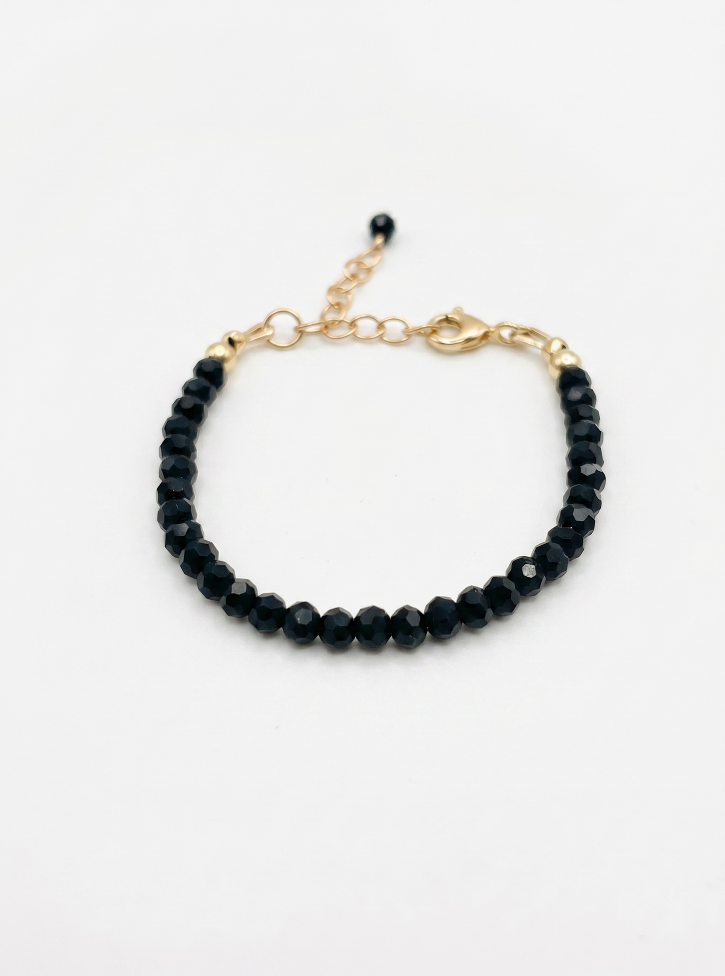 Black Rondel and Gold bracelet