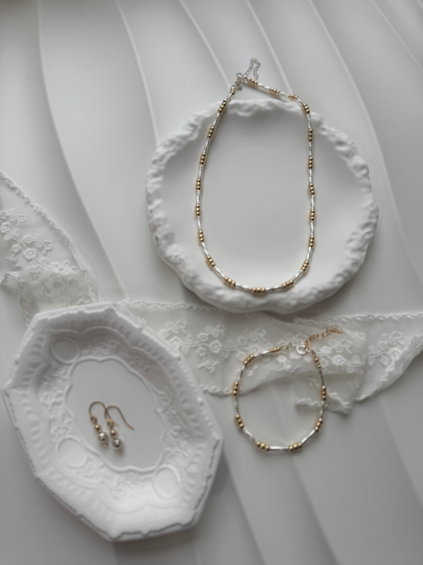 Tubular mixed metal necklace